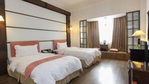 Minibar, blackout curtains, iron/ironing board, rollaway beds