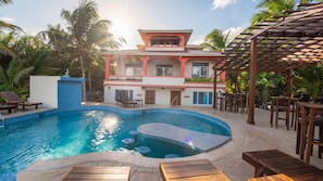 Outdoor pool, pool umbrellas, pool loungers