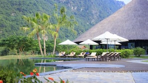 Indoor pool, outdoor pool, open 6:30 AM to 9:00 PM, pool umbrellas