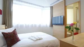 Premium bedding, down duvet, in-room safe, desk