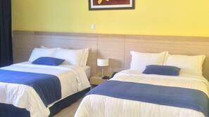Ropa de cama de alta calidad, colchones con acolchado adicional, minibar