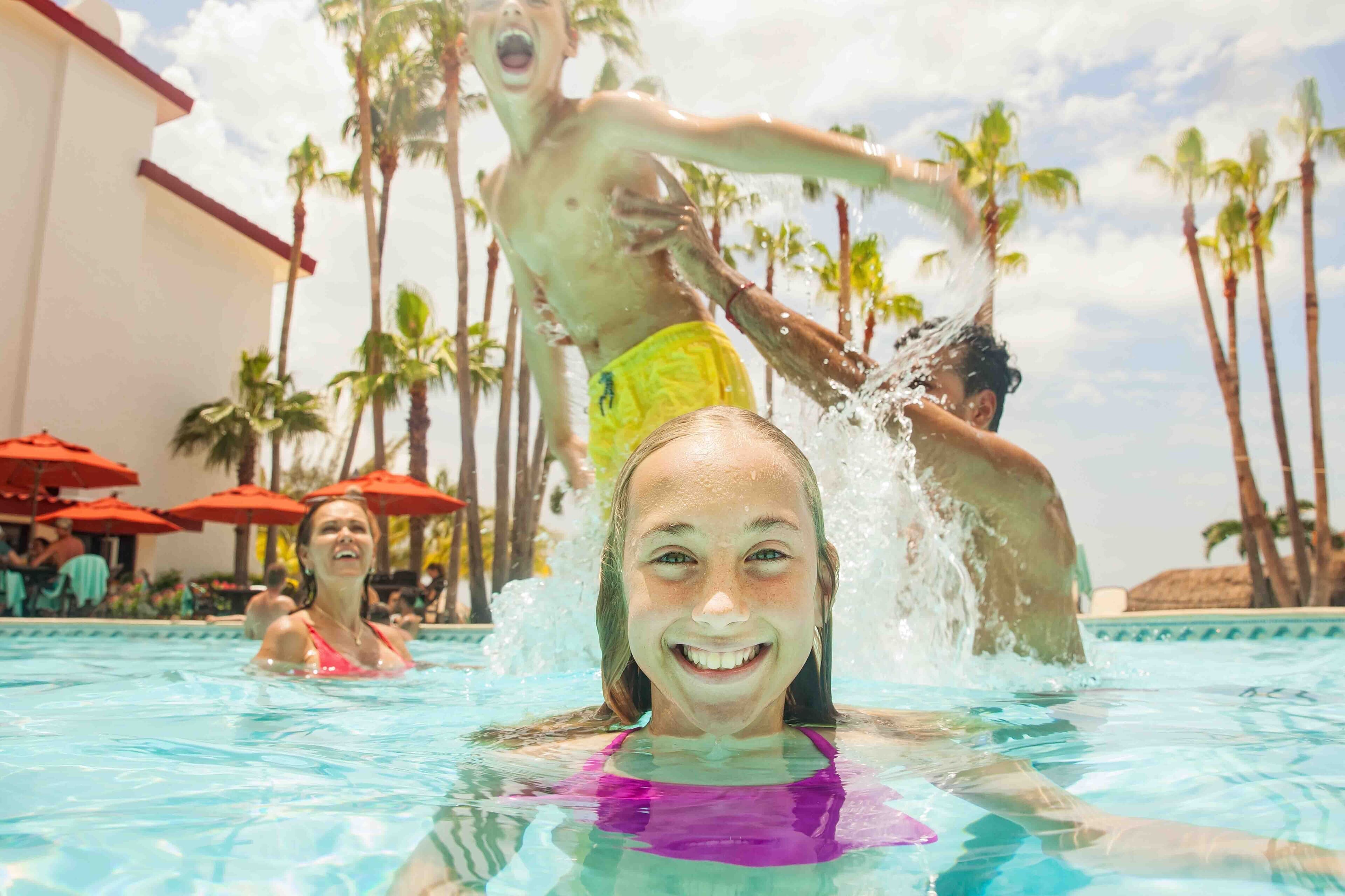 family in the pool at The Royal Cancun All Inclusive Resort in Mexico