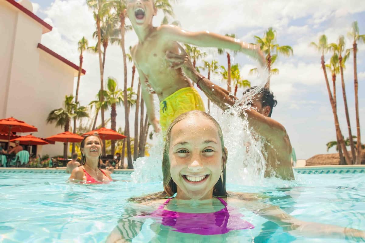 family in the pool at The Royal Cancun All Inclusive Resort in Mexico
