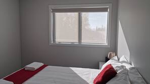 Blackout curtains, iron/ironing board, free WiFi, linens