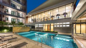 Outdoor pool, pool umbrellas, sun loungers