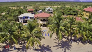 Private beach, sun loungers, beach towels, beach massages