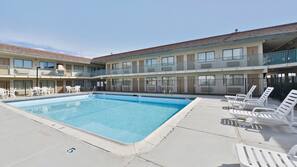 Seasonal outdoor pool, sun loungers