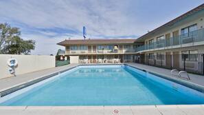 Seasonal outdoor pool, sun loungers