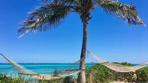 Private beach, white sand, sun-loungers, beach umbrellas