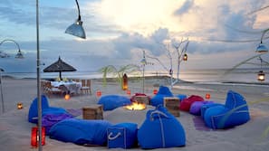 On the beach, sun-loungers, beach umbrellas, beach towels