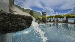 Seasonal outdoor pool, pool loungers