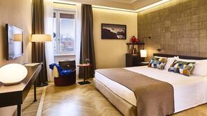 Hypo-allergenic bedding, pillow-top beds, minibar, in-room safe