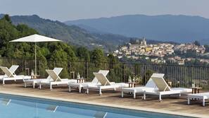 Indoor pool, outdoor pool, pool umbrellas, sun loungers