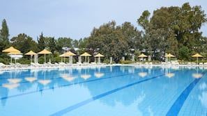 Indoor pool, outdoor pool, pool umbrellas