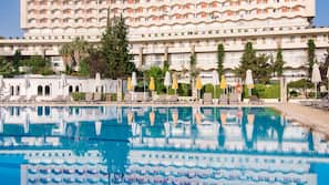 Indoor pool, outdoor pool, pool umbrellas