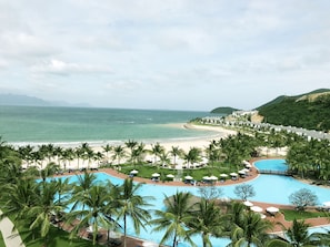 Outdoor pool, pool umbrellas, sun loungers