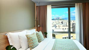 Premium bedding, pillow top beds, minibar, in-room safe
