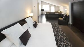 Ropa de cama de alta calidad, minibar, caja fuerte y escritorio