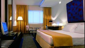Premium bedding, down duvet, memory foam beds, minibar