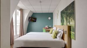 Premium bedding, desk, blackout drapes, soundproofing