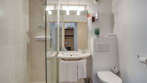 Shower, free toiletries, hair dryer, towels