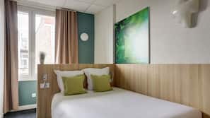 Premium bedding, desk, blackout drapes, soundproofing