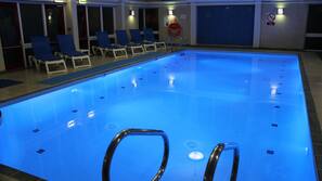 Indoor pool, open 7:30 AM to 9:00 PM, pool loungers