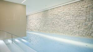 Indoor pool, outdoor pool, pool umbrellas, pool loungers