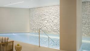 Indoor pool, outdoor pool, pool umbrellas, pool loungers