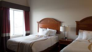 Premium bedding, pillowtop beds, desk, laptop workspace