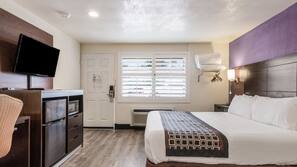 Desk, laptop workspace, blackout curtains, iron/ironing board