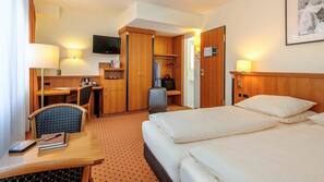 Pillowtop beds, free minibar items, in-room safe, desk
