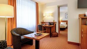 Pillowtop beds, free minibar items, in-room safe, desk