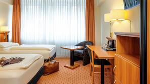 Pillowtop beds, free minibar items, in-room safe, desk