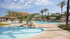 Indoor pool, outdoor pool, pool umbrellas, pool loungers