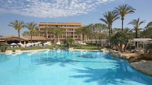 Indoor pool, outdoor pool, pool umbrellas, pool loungers