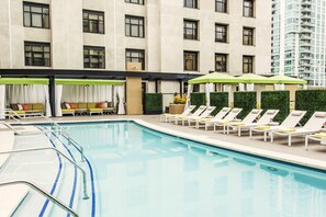 Outdoor pool, open 7 AM to 8:00 PM, cabanas (surcharge), sun loungers