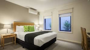 Premium bedding, individually furnished, desk, laptop workspace
