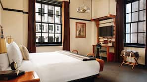 Premium bedding, down comforters, pillowtop beds, minibar