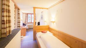 Premium bedding, down comforters, minibar, in-room safe