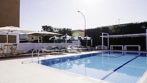 Outdoor pool, open 8 AM to 7 PM, pool umbrellas, sun loungers