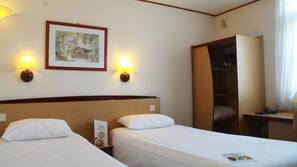 Desk, blackout curtains, iron/ironing board, rollaway beds