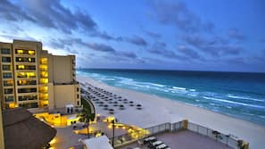 On the beach, beach towels, beach volleyball, beach bar