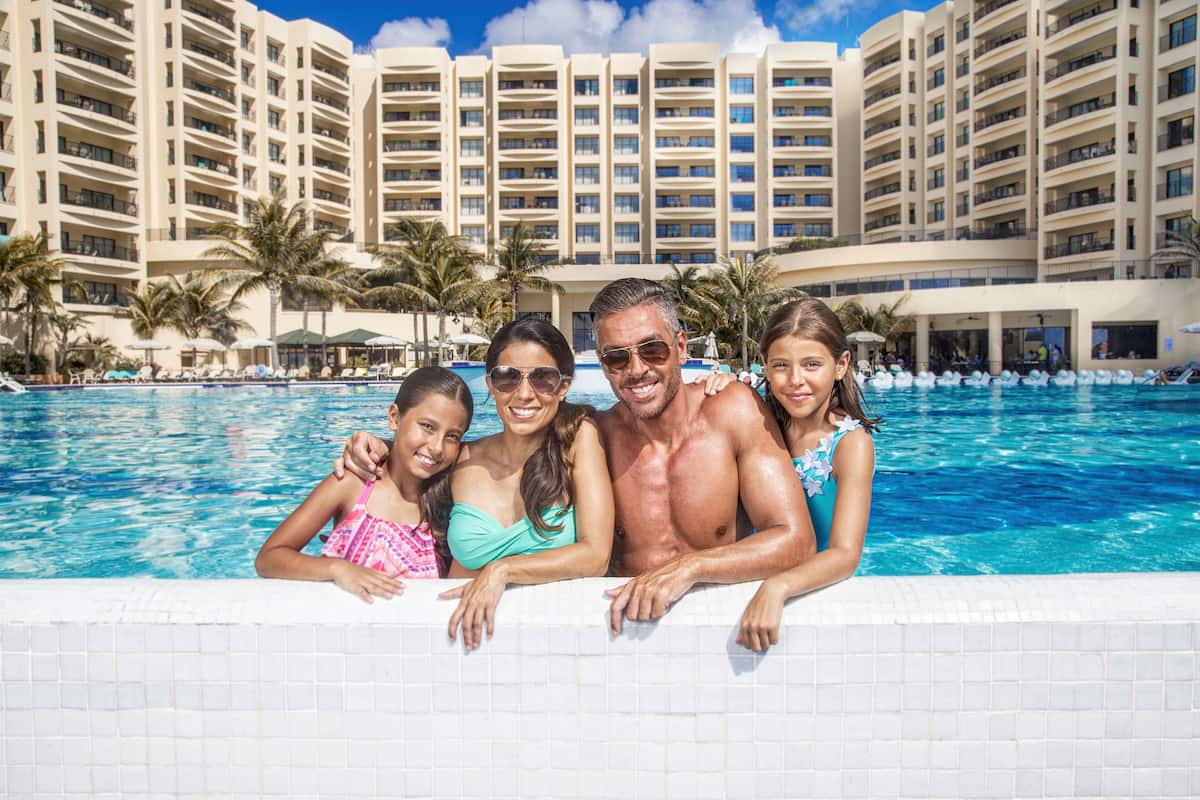 family in the pool at The Royal Sands Resort & Spa Cancun Mexico