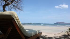 On the beach, beach shuttle, beach umbrellas, beach towels