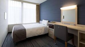 Desk, blackout curtains, free WiFi, linens