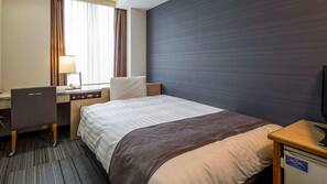 Desk, blackout curtains, free WiFi, linens