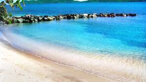 Private beach, white sand, sun loungers, beach towels