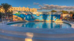 2 outdoor pools, open 10:00 AM to 6:00 PM, pool umbrellas, pool loungers