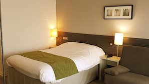 Premium bedding, desk, blackout drapes, soundproofing